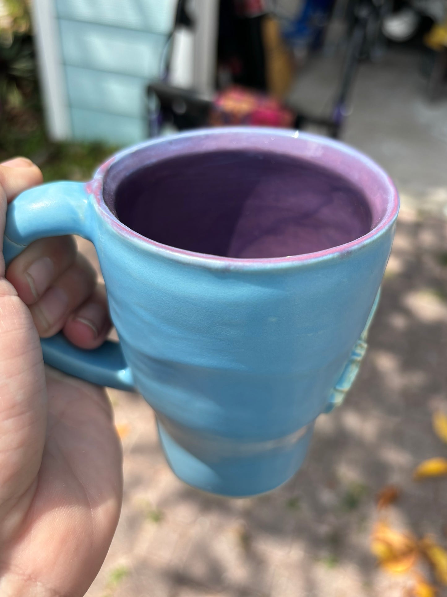 Photo of a blue and purple mug.